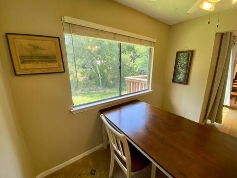 unfurnished office featuring baseboards