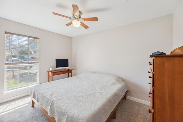 12810 Irongate Ave, Austin, TX 78727 - carpeted bedroom with multiple windows and ceiling fan