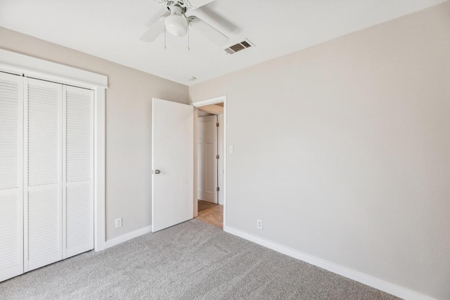12810 Irongate Ave, Austin, TX 78727 - unfurnished bedroom with carpet, a closet, and ceiling fan