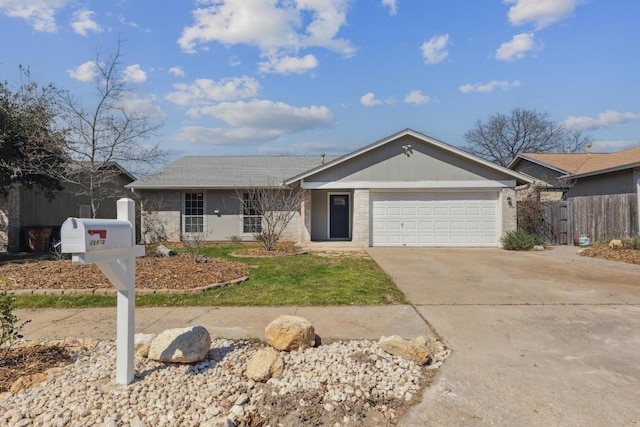 12810 Irongate Ave, Austin, TX 78727 - single story home featuring an attached garage, concrete driveway, and brick siding