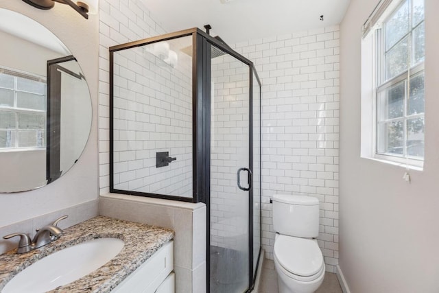12810 Irongate Ave, Austin, TX 78727 - bathroom with vanity and a shower stall