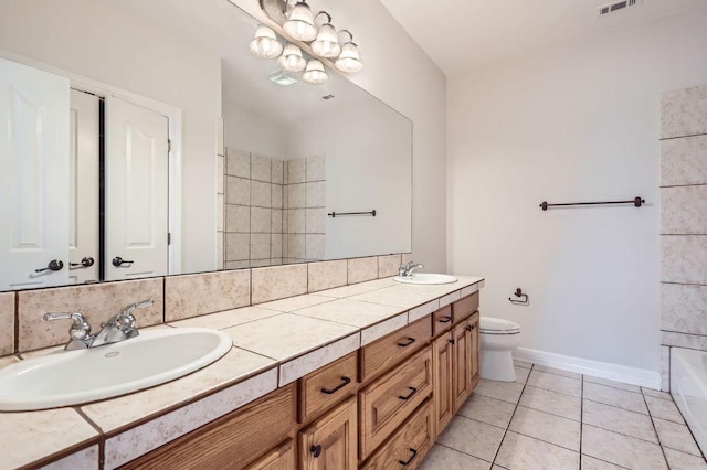 210 Amandas Way, Leander, TX 78641 - bathroom featuring double vanity and tile patterned flooring