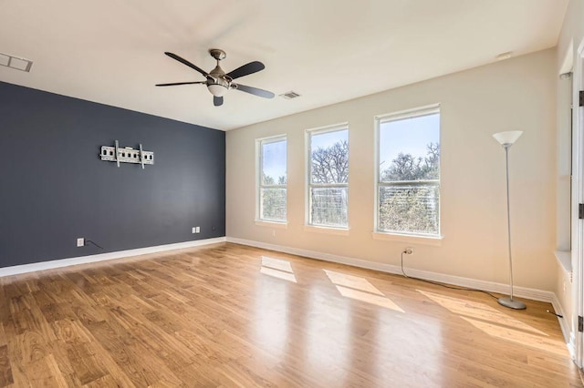 210 Amandas Way, Leander, TX 78641 - empty room featuring ceiling fan and light wood finished floors