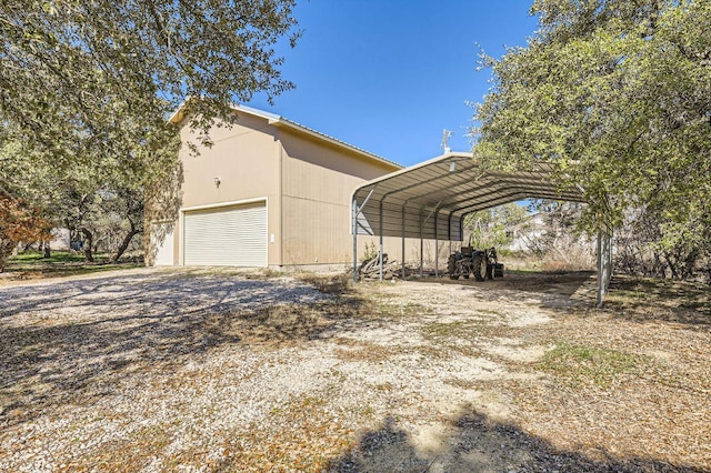 210 Amandas Way, Leander, TX 78641 - view of home's exterior featuring driveway and a detached garage