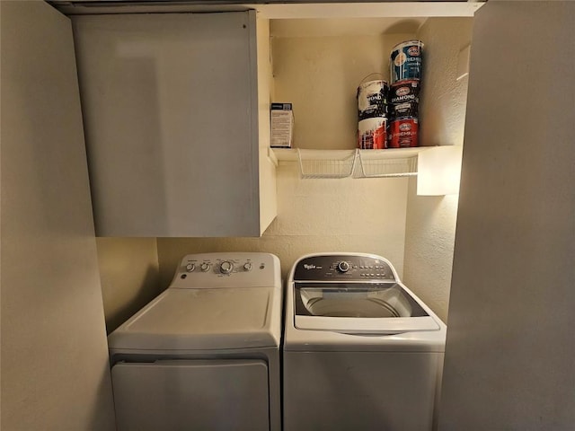 laundry room with laundry area and washer and clothes dryer