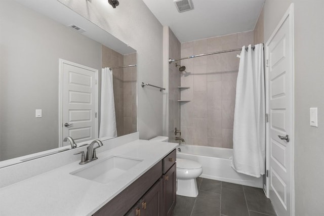 2201 Bel Paese Bnd, Leander, TX 78641 - bathroom featuring visible vents, tile patterned flooring, shower / bath combo, vanity, and toilet
