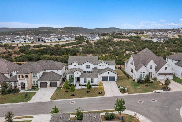 aerial view featuring a residential view and a mountain view