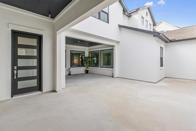 2201 Bel Paese Bnd, Leander, TX 78641 - back of house featuring a patio and stucco siding
