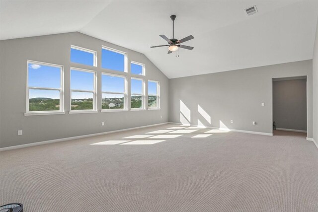 2201 Bel Paese Bnd, Leander, TX 78641 - unfurnished living room featuring carpet, a ceiling fan, baseboards, lofted ceiling, and visible vents