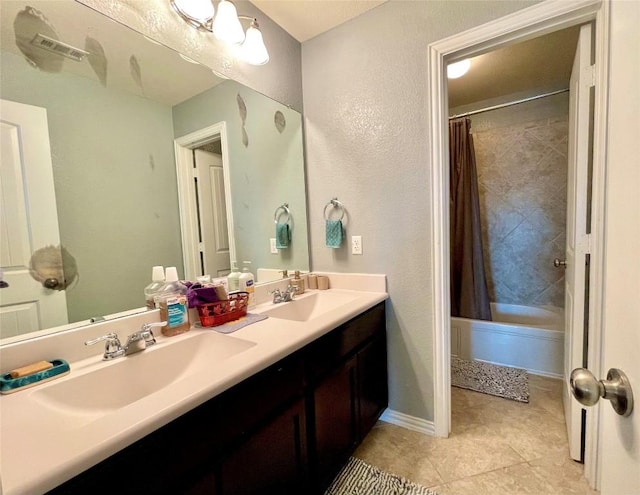 full bath with double vanity, a sink, visible vents, and shower / tub combo with curtain