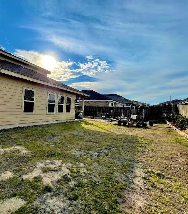 view of yard with fence