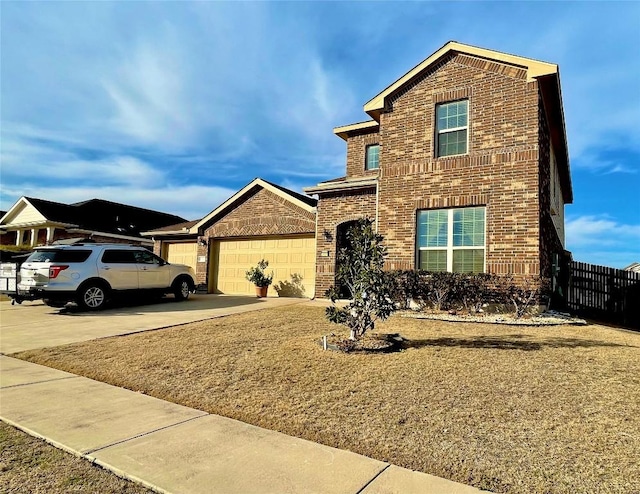 traditional-style house featuring an attached garage, brick siding, fence, and driveway
