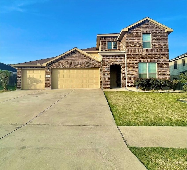 3707 Ozark Dr, Killeen, TX 76549 - traditional-style house with brick siding, driveway, an attached garage, and a front lawn