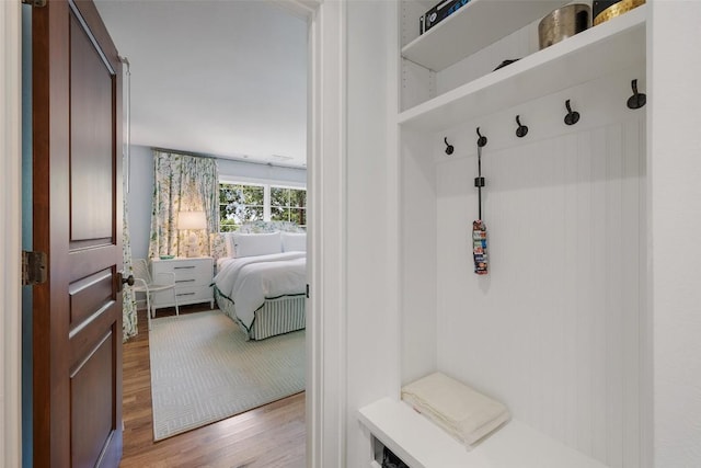 mudroom with light wood finished floors