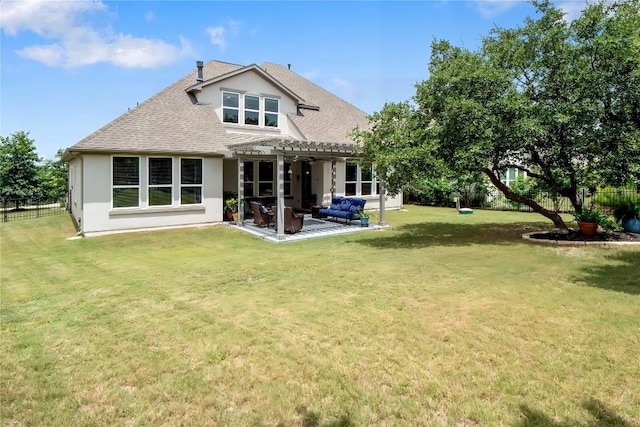 back of house featuring a patio, a lawn, roof with shingles, stucco siding, and a pergola