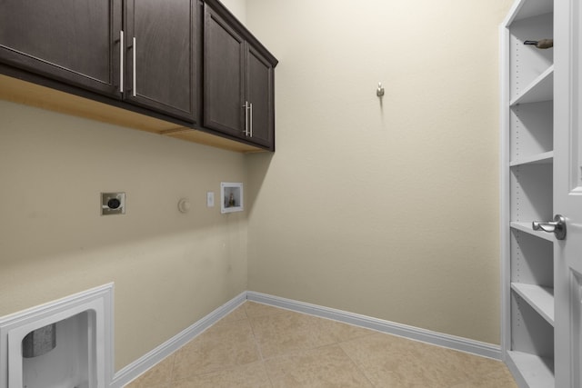 224 Tavish Trl, Austin, TX 78738 - washroom with cabinet space, hookup for an electric dryer, washer hookup, baseboards, and light tile patterned flooring