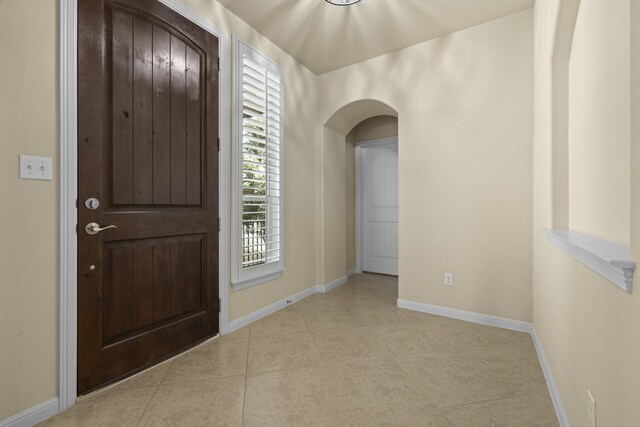 224 Tavish Trl, Austin, TX 78738 - entryway with arched walkways and light tile patterned floors