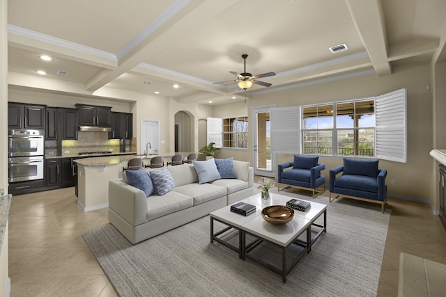 224 Tavish Trl, Austin, TX 78738 - living area featuring arched walkways, coffered ceiling, beam ceiling, light tile patterned floors, and recessed lighting