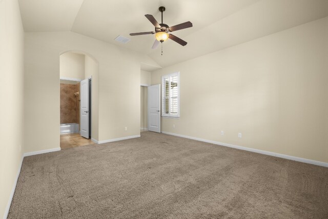 224 Tavish Trl, Austin, TX 78738 - unfurnished bedroom featuring light carpet, lofted ceiling, baseboards, ensuite bathroom, and a ceiling fan