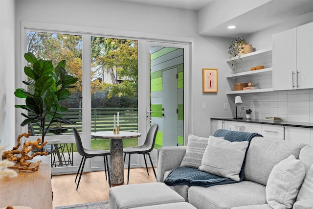 living area with light wood-style floors