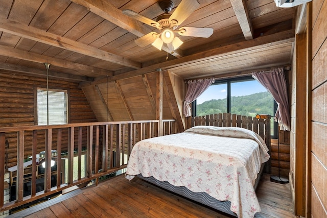 bedroom featuring wooden ceiling, rustic walls, beamed ceiling, and wood-type flooring