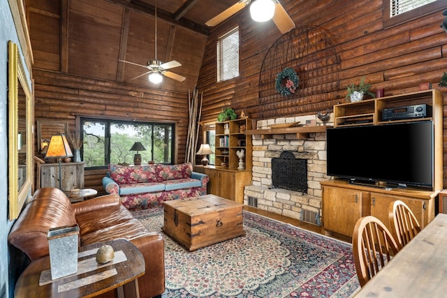 living room featuring wooden ceiling, rustic walls, ceiling fan, and beamed ceiling