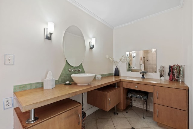 bathroom featuring crown molding, backsplash, vanity, and tile patterned floors