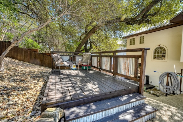 wooden terrace with fence