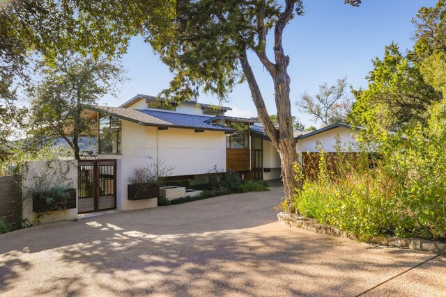 1400 Mount Larson Rd, Austin, TX 78746 - view of front of house featuring french doors