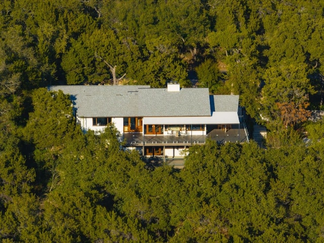 1400 Mount Larson Rd, Austin, TX 78746 - view of subject property featuring a heavily wooded area