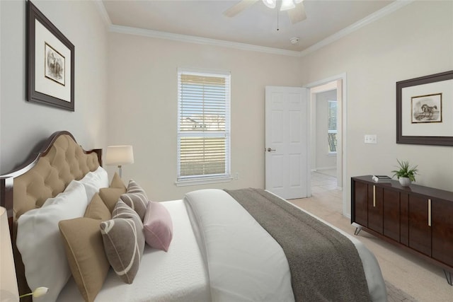 bedroom featuring light colored carpet, ceiling fan, and ornamental molding