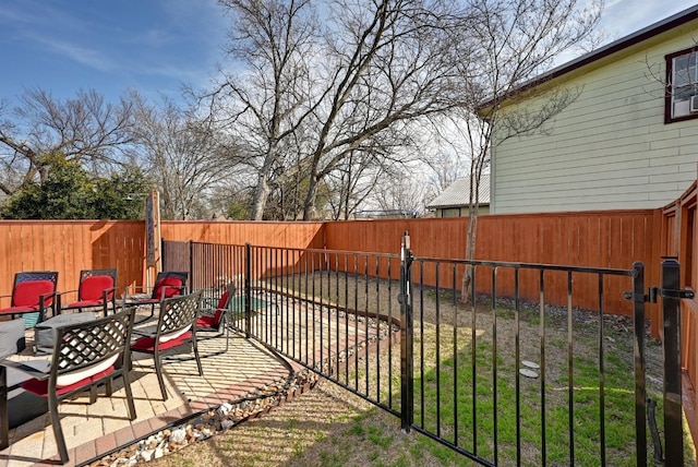 view of patio with a fenced backyard