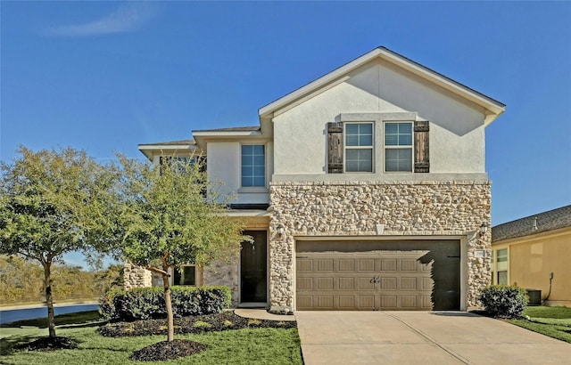 view of front facade with driveway, a garage, stone siding, central air condition unit, and stucco siding