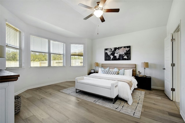 216 Iron Rail Rd, Dripping Springs, TX 78620 - bedroom with light wood-style floors, vaulted ceiling, and ceiling fan