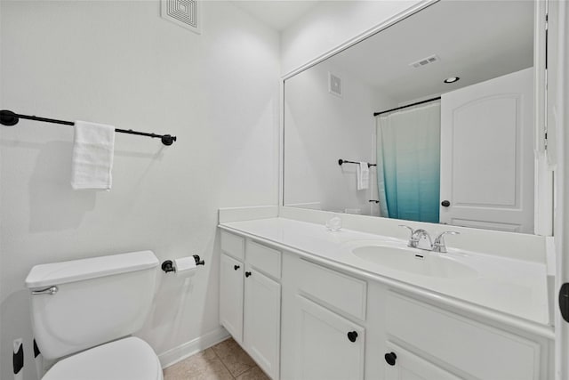 full bathroom with toilet, vanity, visible vents, and tile patterned floors