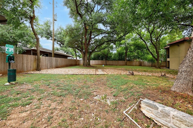 view of yard featuring a fenced backyard