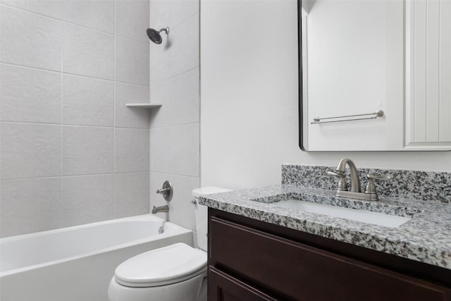 bathroom with toilet, shower / bathtub combination, and vanity