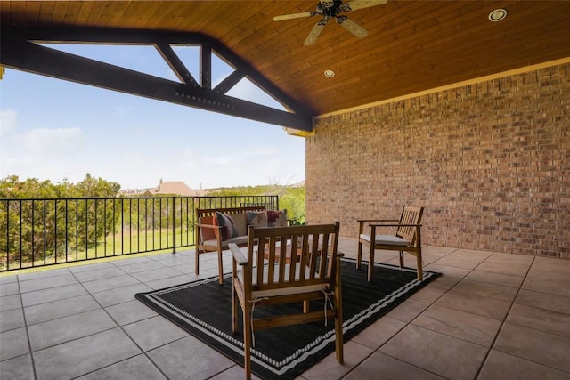 view of patio with outdoor lounge area and a ceiling fan