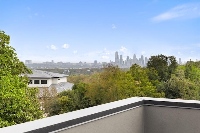 balcony featuring a view of city