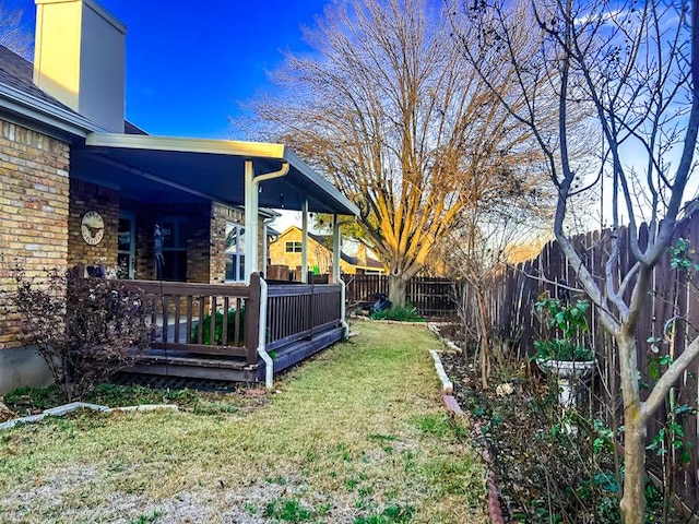 view of yard featuring a fenced backyard