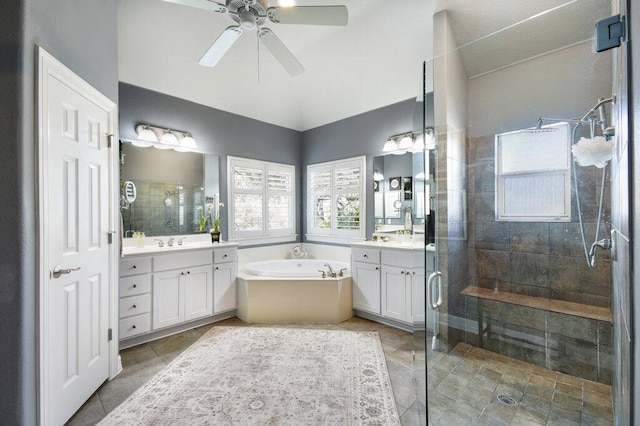 9512 Palmbrook Dr, Austin, TX 78717 - full bath with a shower stall, two vanities, a bath, a ceiling fan, and tile patterned flooring