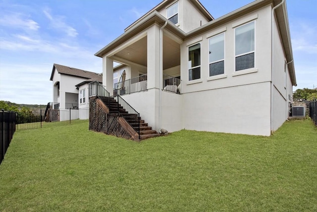 4737 Modena Bay Bnd, Leander, TX 78641 - back of property featuring stucco siding, stairway, and central AC