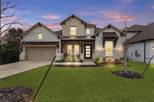 4737 Modena Bay Bnd, Leander, TX 78641 - view of front of property featuring stone siding, stucco siding, and concrete driveway