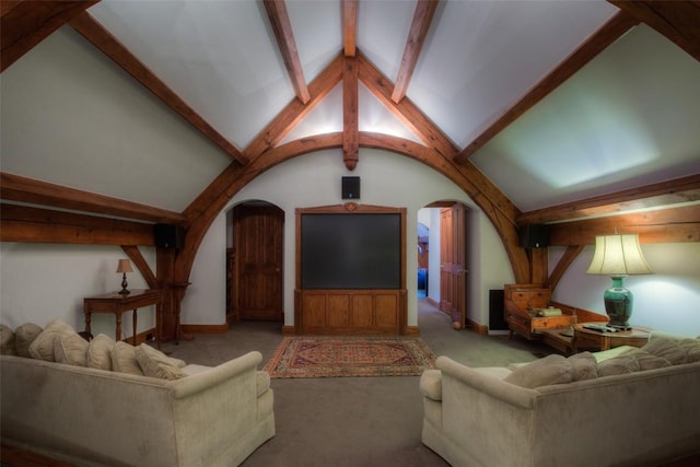 living room with arched walkways, carpet flooring, vaulted ceiling with beams, and baseboards