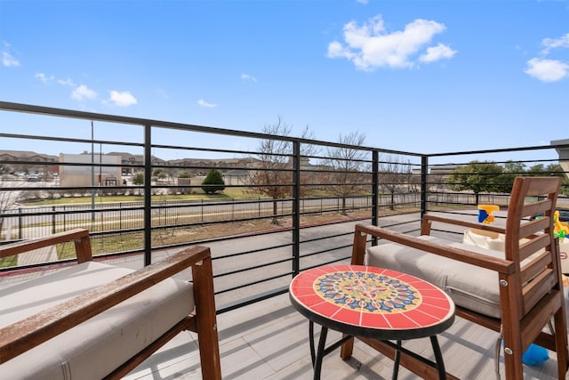 balcony featuring a residential view