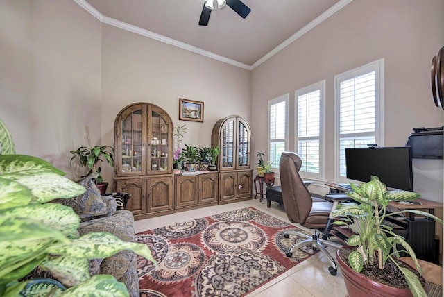 home office with ornamental molding, a ceiling fan, and light tile patterned floors