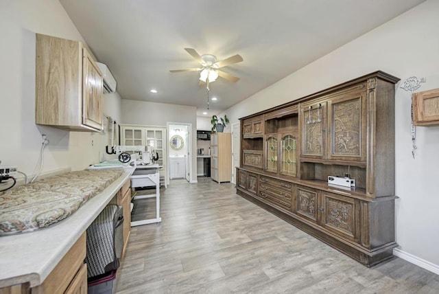 kitchen with recessed lighting, a ceiling fan, baseboards, light wood-style floors, and light countertops