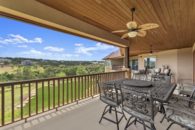 view of patio / terrace featuring outdoor dining space and ceiling fan