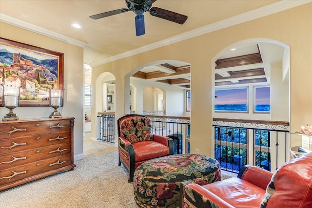 sitting room featuring carpet floors, crown molding, recessed lighting, coffered ceiling, and beamed ceiling