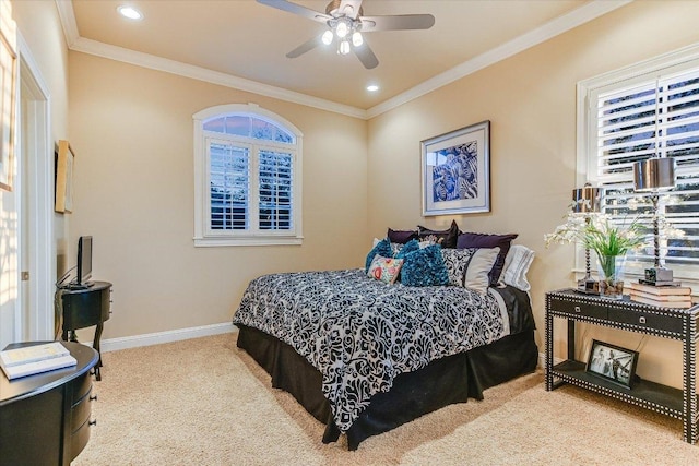 carpeted bedroom featuring baseboards, recessed lighting, a ceiling fan, and crown molding